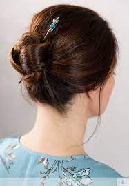 Beautiful Hairstyle With An Elegant Sea Blue Green Accented Hair Stick Unique And Beautiful Hair A Beautiful Hair Accessories Hairstick Hairstyles Hair Sticks