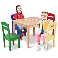 Look for lower activity tables for young toddlers, or consider an adjustable set that grows with your child—simply swap out the legs to convert the table to the height of a kid's desk. Costway Kids 5 Piece Table Chair Set Pine Wood Multicolor Children Play Room Furniture Walmart Com Table And Chairs Kid Spaces Kid Table