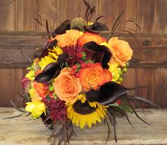 Yellow Orange And Burgundy Bridal Bouquet Including Sunflowers Callas Roses Freesia And Dah Fall Wedding Bouquets Boho Wedding Flowers Fall Wedding Flowers