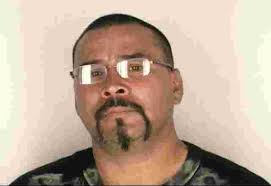 One Gang Member Still Wanted in Stabbing