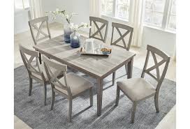 Check out our dining room table selection for the very best in unique or custom, handmade pieces from our kitchen & dining tables shops. Ashley Signature Design Parellen Casual Rectangular Dining Table With Melamine Top Rooms And Rest Dining Tables