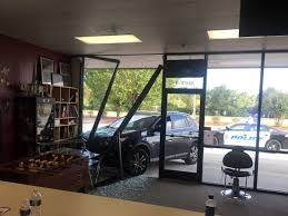 Amateur beautiful young couple decide to make a show in front of the window. Driver Crashes Through Window At Wilmington Business Wway Tv
