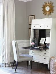 Proper to its age, see pictures, this piece was made in the early 1900's. White Secretary Desk Transitional Den Library Office Courtney Hill Interiors