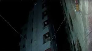 Dimly lit alley resembling Lyari at night