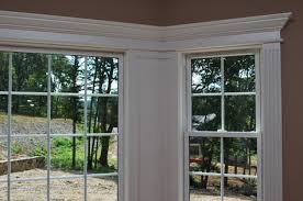 Arched Bay Window Trim Ideas Bay Window Pediment Head Pilasters Raised Panel Wainscoting Close Up Window Molding Trim Moldings And Trim Interior Window Trim