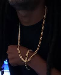 This means that it has 58.3% of gold. 8mm 14k Or 18k Gold Plated Miami Cuban Link Set Left Lane J