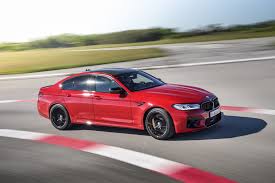 These include a more powerful engine, a reprogrammed. Bmw M5 Towing Massive Boat Races Vw Golf Gti At The Lights