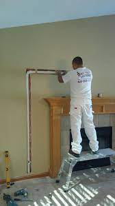 Your home theater will look flawless with these wall plates t. Tv Installation Over Fireplace Sandwich Il Drywall Repair Painting Remodeling Naperville Aurora Oswego