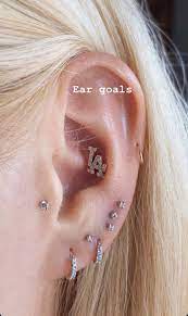 Pin By Bad Bunnies On Piercings Cute Piercings Piercings Body Electric Tattoo