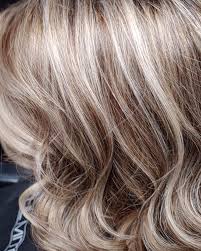 Chunky hues of golden blonde, light ash blonde and honey blonde will add depth and texture to your hair for a look that will drive any man wild with passion! Updated 40 Blonde Hair With Brown Lowlights Looks August 2020