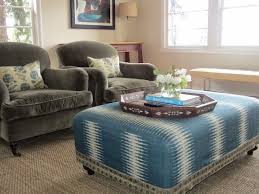 Peter is always on the hunt for inspiration for new textiles and wallpapers, travelling the world every year and finding ideas abroad as well as in his own backyard. This Ottoman Is Upholstered In Peter Dunham S Ikat Fabric Color Peacock Furniture Upholstery Family Living Rooms Furnishings