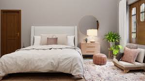 This whole bedroom interior actually consists of small but impactful weekend diy's, such as this color block style vanity space! Modern Boho Master Bedroom Design With Wood And Blush Tones By Spacejoy