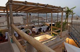 A Small Pool Sprinkled With Bougainvillea Petals Gives A Sense Of Coolness And Peace To This City Roof Terrace In Fez