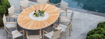 Our teak dining set is a uniquely modern interplay of very durable teak wood featuring our beautiful teak chairs. Luxury Outdoor Dining Tables Chairs Modern Design Premium Quality