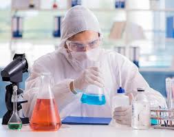 Chemist working in the laboratory with hazardous chemicals - Stock Image -  Everypixel