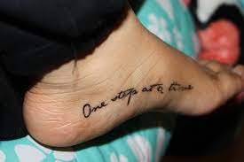 One Step At A Time Tattoo I D Probably Never Get A Foot Tattoo But Foot Tattoos Foot Tattoo Time Tattoos