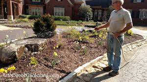 Your local landscape supply store. Driveway Island Redo Refreshes Landscape Art Of Stone Gardening