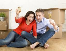 champagne toast moving in a new house ...