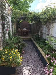 This 91 Inch Wide Skinny House Is Packed With Brilliant Small Space Storage Ideas Courtyard Gardens Design Side Yard Landscaping Small Backyard Landscaping