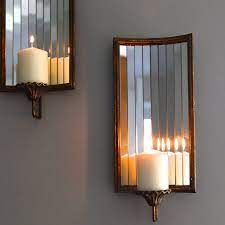 Wall candle sconces can make a wonderful addition to any room in your home. Venetian Wall Candle Holder By The Forest Co Wall Candle Holders Candle Wall Sconces Wall Mounted Candle Holders