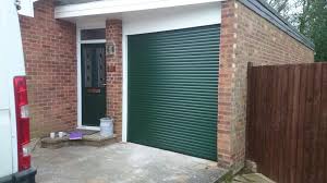 Fitted From Our Essex Depot By Wayne And Tommy Single Electric Roller Door In Fir Green I Think This Colour Re Roller Doors Garage Door Systems Garage Doors