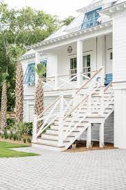 Great selection of cottage home outdoor! Kustenhaus Mit Sparren Weisser Fassade Und Blauen Malibu Markisen Kustenhaus Beachhousedecor Beach House Design Beach House Exterior Beach House Interior