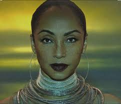 Bruce Foxton of The Jam pictured here with Sade Adu.