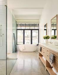 This attic bathroom features a white floating vanity, circular vessel sink, curved mirror, white side table, wicker basket, white rug, and gray granite. 42 Modern Bathrooms Luxury Bathroom Ideas With Modern Design