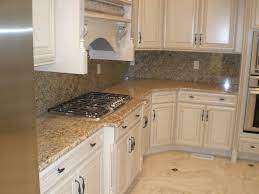 Granite in new venetian gold; Cabinet Color Differences And Love The Color Of The Counter Tops Description From Pinterest Venetian Gold Granite Antique White Kitchen White Kitchen Cabinets