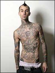 Also famous for his tattoos, he gives the reason for getting them, so he could never go and get a normal job. Oh Travis Travis Barker Tattoos Travis Barker Celebrity Tattoos
