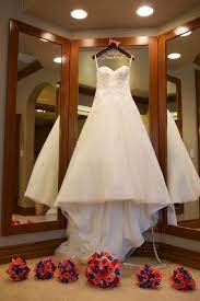 Gorgeous Wedding Dress Hanging On A Personalized Hanger Twisted Hangers Personalizedhanger Wedding Dress Photography Wedding Dress Hanger Wedding Hangers