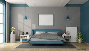 Blaues schlafzimmer mit blumen quilt auf lackierten holzbett farbe des monats frischer wind mit himmlischem blau bildergalerie von ferienhaus mit hunden am strand lindbergh ferienwohnung blaues haus am meer unten dierhagen firma blaues schlafzimmer hinter schiebeturen stockfoto und mehr stock photo. Blaues Und Graues Modernes Schlafzimmer Foto Vorratig Crushpixel