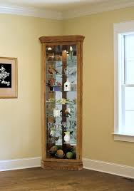 We've got display cabinets for kitchen and bedroom corners, or more discreet shelves with cupboards to keep bathroom essentials stowed away. Clockway Heartwood Malik Corner Curio Cabinet Classic Oak Made In Usa Lhw3020