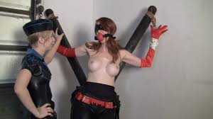 Superheroine Batgirl Captured Stripped And Humilitaed