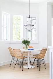 I've had this old wicker rocking chair for years now and i thought that it would be a perfect candidate for today's post as i share my step by step guide for painting wicker. Round Saarinen Dining Table With Modern Wicker Dining Chairs Transitional Dining Room Saarinen Dining Table Wicker Dining Chairs Decor