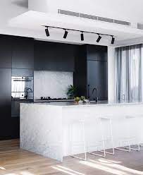 Bidding on storage auctions, specially the ones big enough to be part of tv games, is a very good way to make money. Sophisticated High End Kitchen Colour Palette Perfection Black White And Marble Blonde Floors Kitchen Decor Modern Modern Kitchen Design Kitchen Marble