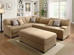 This leather and fabric sectional sofa based on durable wooden frame includes decorative nailheads for more aesthetics. 9759 Minnis Sectional Sofa In Brown Fabric By Homelegance