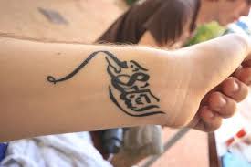 21 Cool Arabic Tattoos With Meanings Piercings Models Arabic Tattoo Tattoo Designs Arabic Tattoo Design