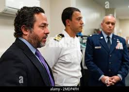 Attorneys Brian Bouffard, left, accompanied by U.S. Navy Lt. Cmdr. Aaron  Shephard, and U.S. Air Force Major Jason Cordova, speak with reporters  after the second day of an arraignment hearing for their client Malaysian  defendant Mohammed Nazir bin Lep ...