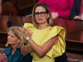 A style expert said Kyrsten Sinema's yellow dress at the State of ...