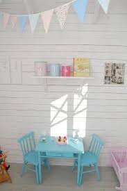 Love The White Walls And Coloured Furniture And Bunting Play Houses Playhouse Interior Cubby Houses
