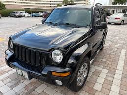 Image result for Brilliant Black 2003 Jeep