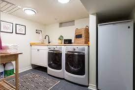 The white wall in the background is left empty, so you can be creative in doing a makeover to the wall. Decor And Storage Tips For Basement Laundry Rooms Hgtv