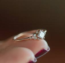 With A Ruby In The Centre Womens Engagement Rings Simple Engagement Rings Wedding Rings Unique
