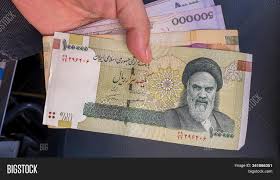The official currencies of iran, oman, and yemen. Hand Holding Iranian Image Photo Free Trial Bigstock