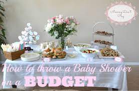 Throwing A Simple And Elegant Baby Shower On A Tight Budget From Wedding Shower Decorations Baby Shower Decorations For Boys Country Bridal Shower Decorations