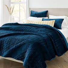 Lyon microfiber solid oversized queen quilt set. Lush Velvet Linear Coverlet Shams