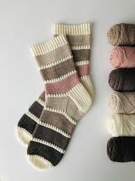 Casual tunics and comfortable knit tops are ready for whatever is on the agenda; Ravelry Color Palette Socks Pattern By Laura Moorats