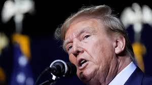 Judge overseeing Georgia election interference case dismisses some charges  against Trump