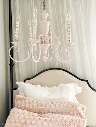 The classic candlestick chandelier, with multiple arms and tiers, can fit a variety of styles, depending on its detailing and finishing. Chandelier Makeover In Minutesbedroom On A Budget Hallstrom Home